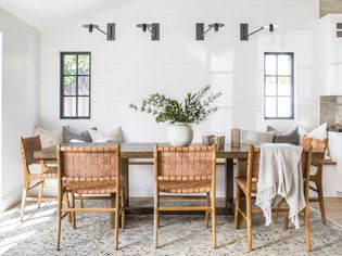 coastal dining room with farmhouse leather chairs