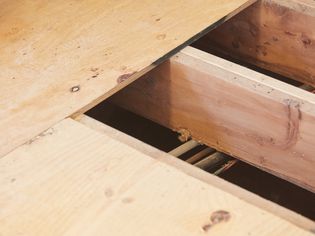 Subfloor with wooden joists closeup