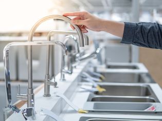 Display of different types of kitchen faucets