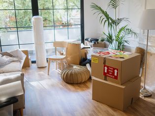 Room filled with moving boxes