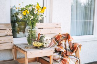 wooden table and chairs with fall prints 