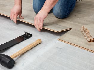 Laminate planks installed over underlayment layer